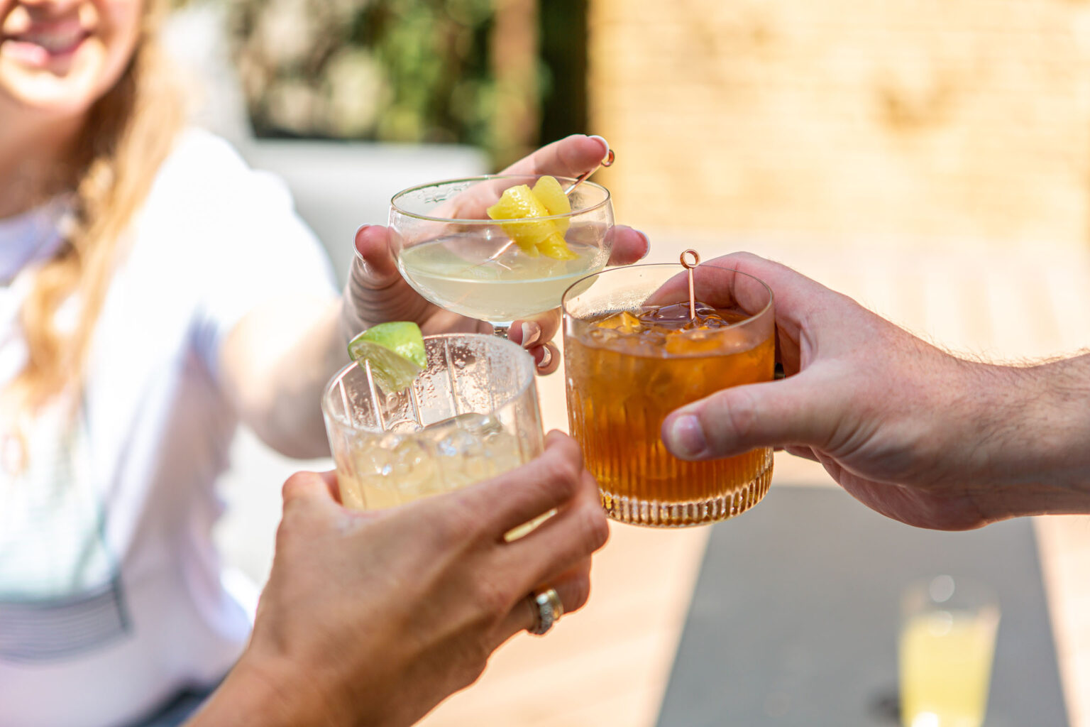 A group of friends enjoy their custom drinks together